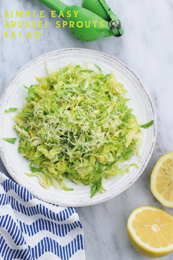simple easy brussel sprouts salad - a REALLY simple yet ADDICTING crunchy brussel sprouts salad with tangy lemon juice vinaigrette and gruyere!