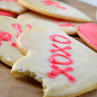 Bite from Conversation Heart Shaped Sugar Cookies