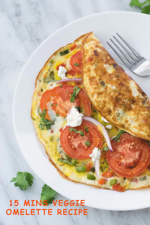 15 mins Veggie Omelette Recipe - a simple out of fridge meal, perfect for breakfast/lunch or dinner. This is one meal I cook when in no mood of cooking! An easy, filling & healthy omelette.