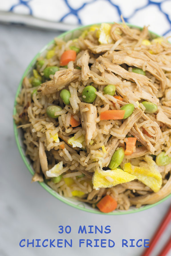 This super delicious CHICKEN FRIED RICE takes 30 mins start to finish, packed with marinated shredded chciken and tons of veggies, this is one meal that will leave you satisfied!