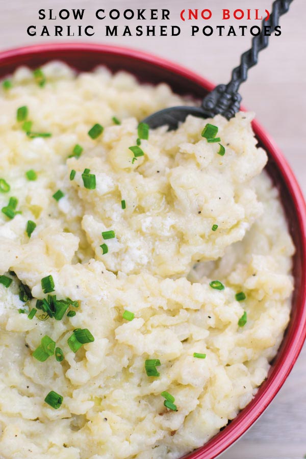 Slow Cooker Garlic Mashed Potatoes - make holiday time easier by making everyone's favorite mashed potatoes in SLOW COOKER! No boiling needed! Just throw everything in slow cooker and get on with your life!