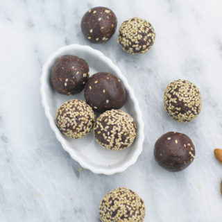 These delicious, just 7 INGREDIENTS & ready under 30 minutes energy bites are so addicting! Packed with healthy almonds, dates, cinnamon, tahini and cocoa powder!