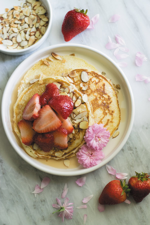 toasted almond strawberry pancakes ready to eat - Delicious & Easy FROM SCRATCH pancakes with TOASTED ALMONDS & STRAWBERRIES. Great for brunch or breakfast!