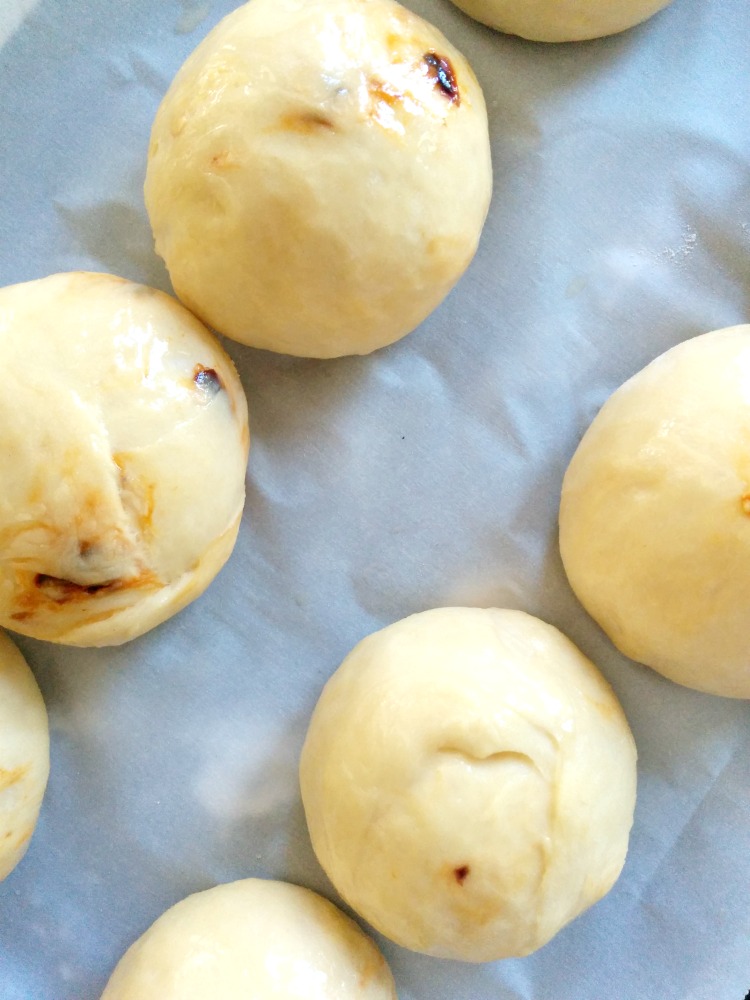 Homemade Burger Buns Dough Rolled and Placed on Tray with Butter Wash