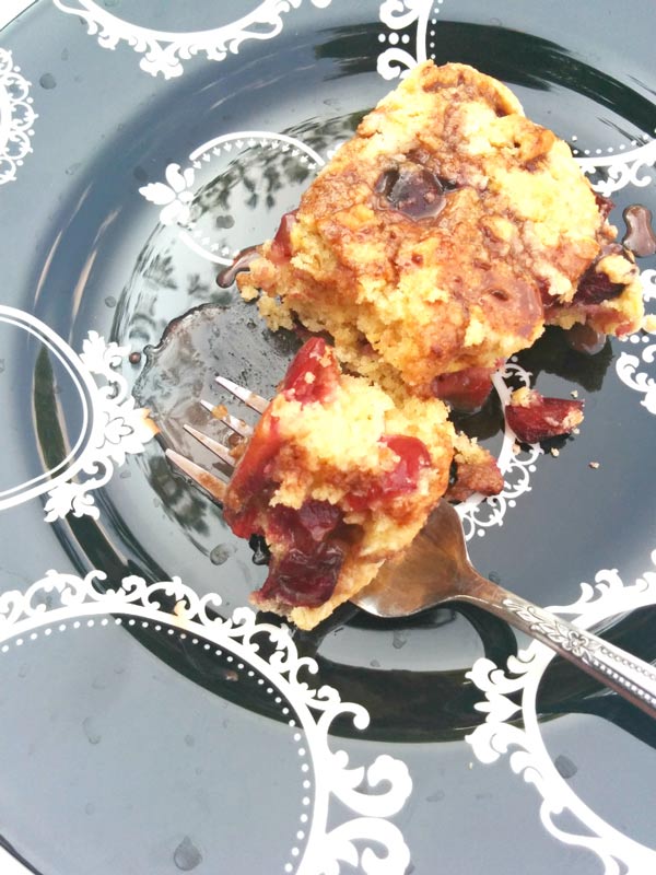 Slice of Cherry Scones with Chocolate Whiskey Sauce.