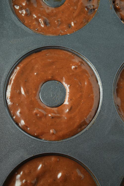 Baked Chocolate Fudge Cake Donuts batter in donut pan