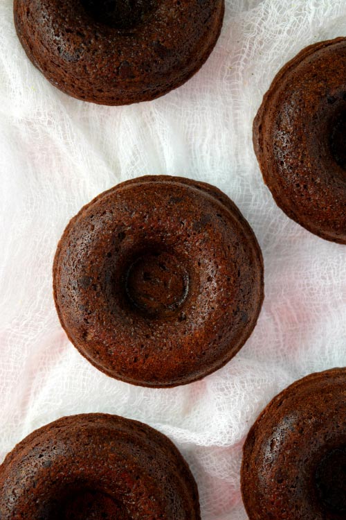 Baked Chocolate Fudge Cake Doughnuts Cooling