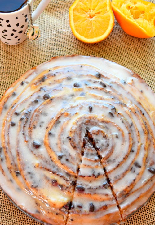 Gaint Chocolate Cinnamon Roll Cake with Orange Icing.