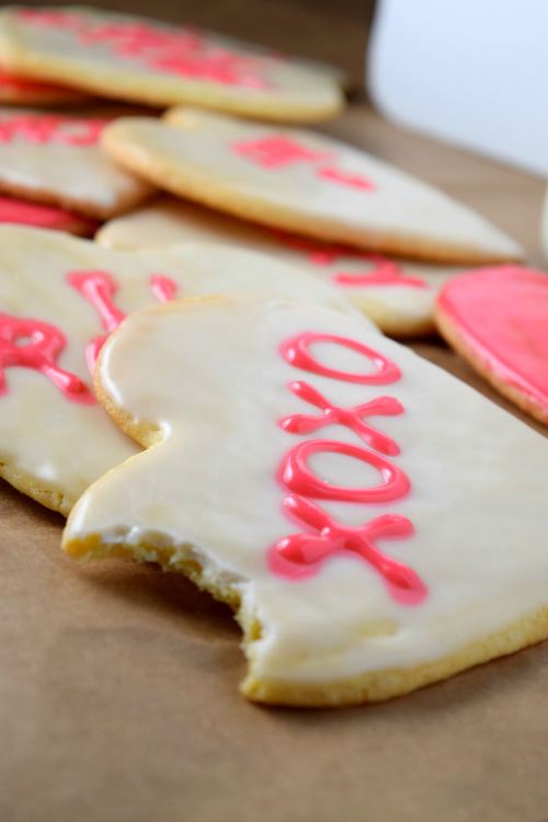 Bite from Conversation Heart Shaped Sugar Cookies