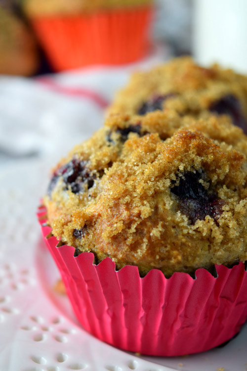 Golden crusted top of Skinny Whole Wheat Blueberry Muffins