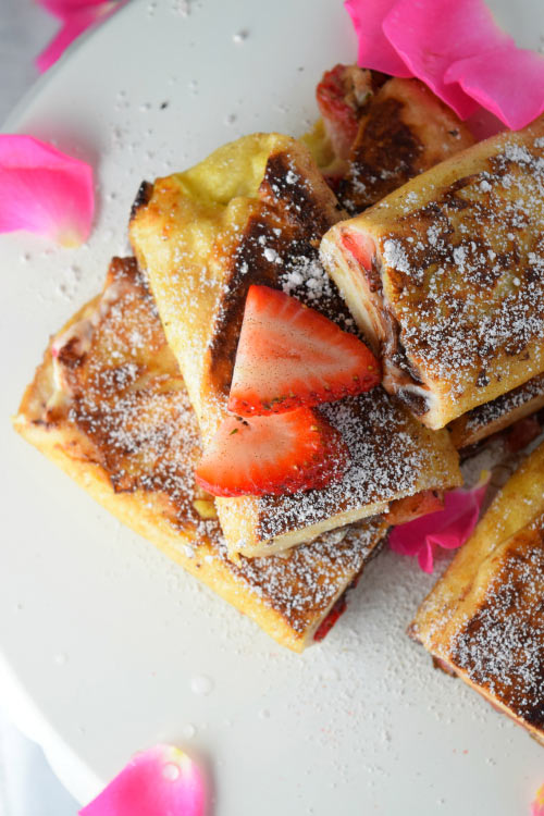 Chocolate Strawberry Cheesecake dripping out of Tortilla French Toast