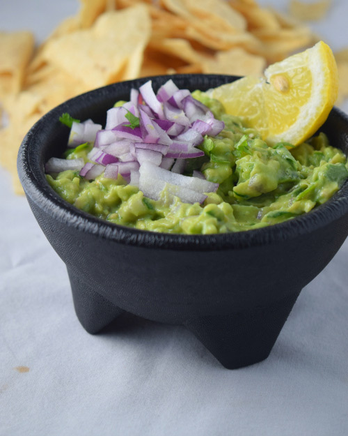 Roasted Tomatillo Guacamole Ready to Dip into