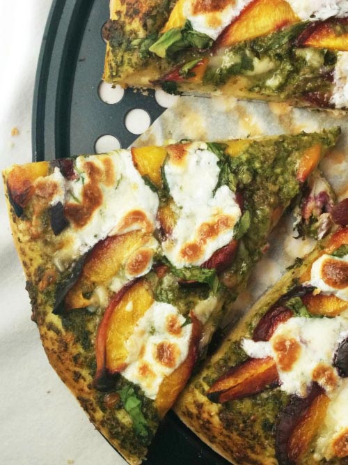 Slice of Almond Pesto Pizza With Peach & Spinach