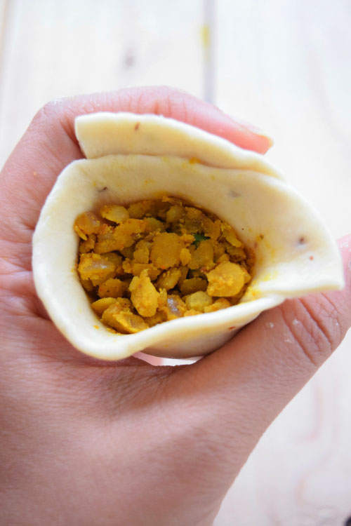 Step 3 Place Filling In Pocket of Lentil Samosas