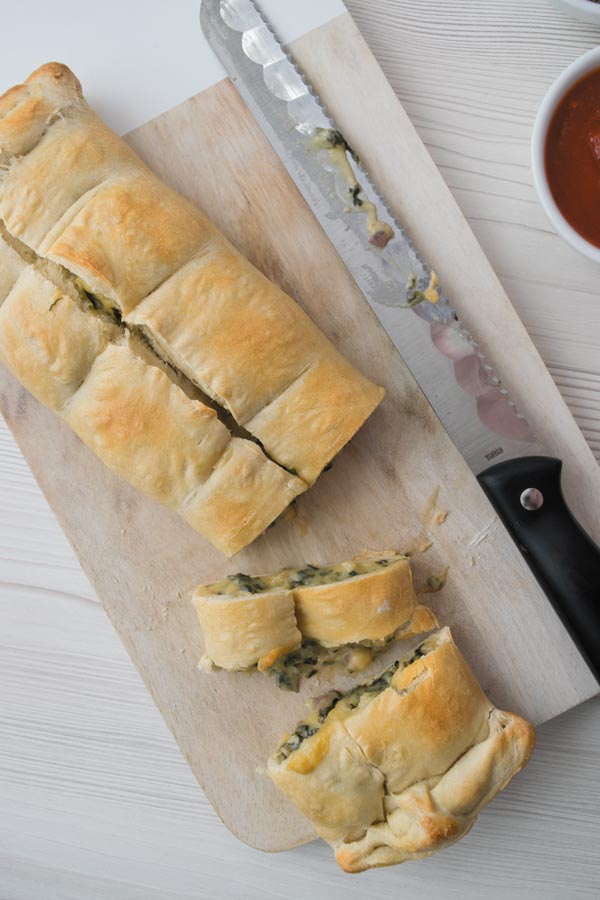 cheesy spinach calzones