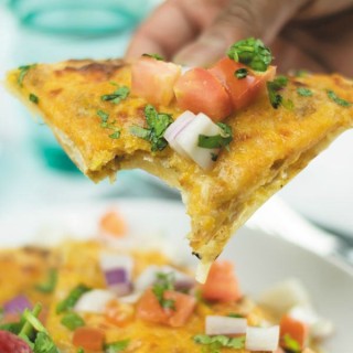 bite from cheesy piri piri chicken quesadilla pizza 1