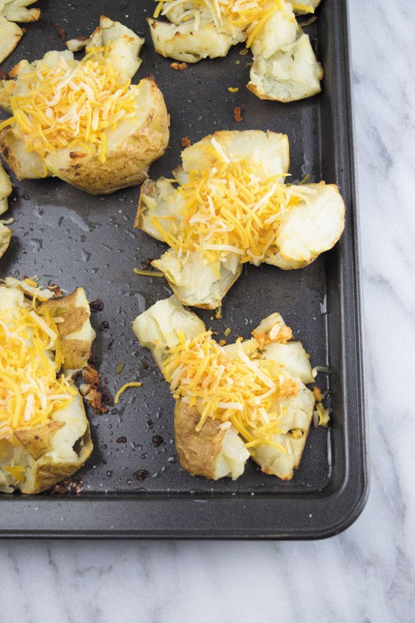 cheese on smashed potatoes