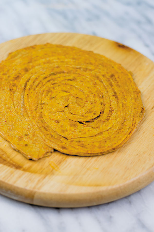 fully rolled out achaari lachha paratha