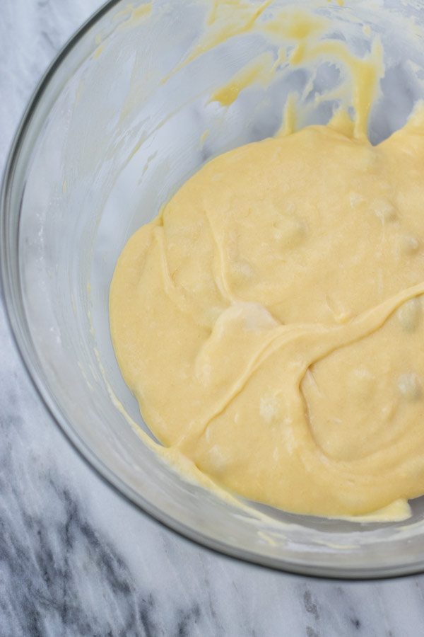 batter ready to be baked for tropical mango muffin