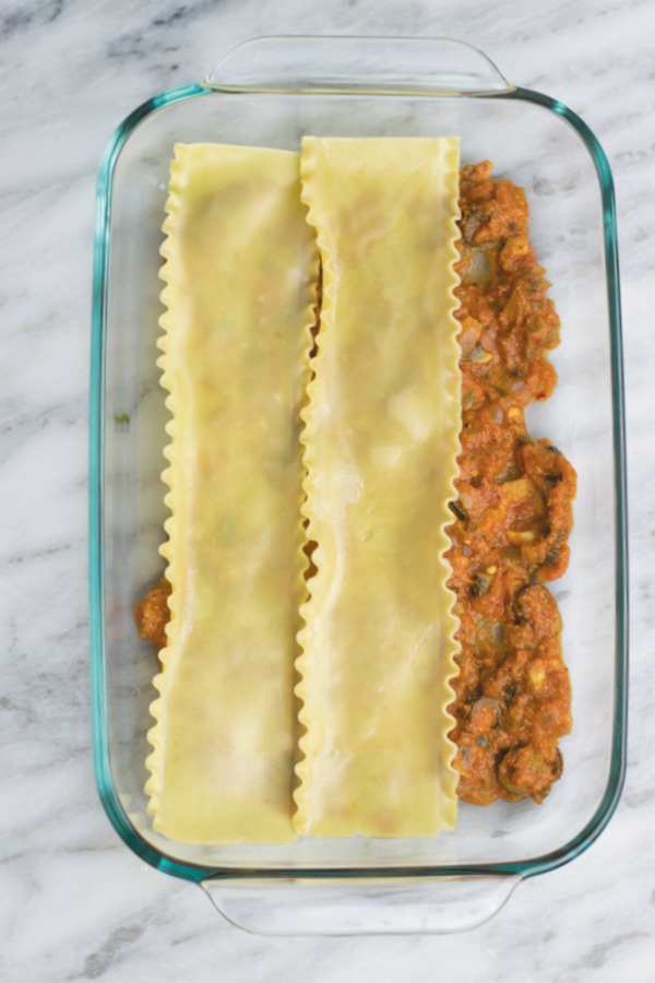 layering pasta for easy vegetarian lasagna