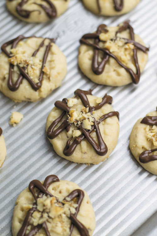 Walnut Butter Cookies - all you need is just few ingredients, less than 30 mins is all you need to make these soft melt-in-mouth cookies! These are soft and makes for a perfect gift!