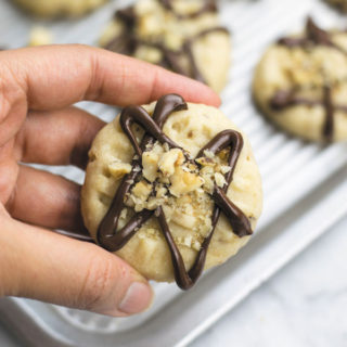 Walnut Butter Cookies - just few ingredients, less than 30 mins is all you need to make these soft melt-in-mouth cookies! Perfect tea time treat!