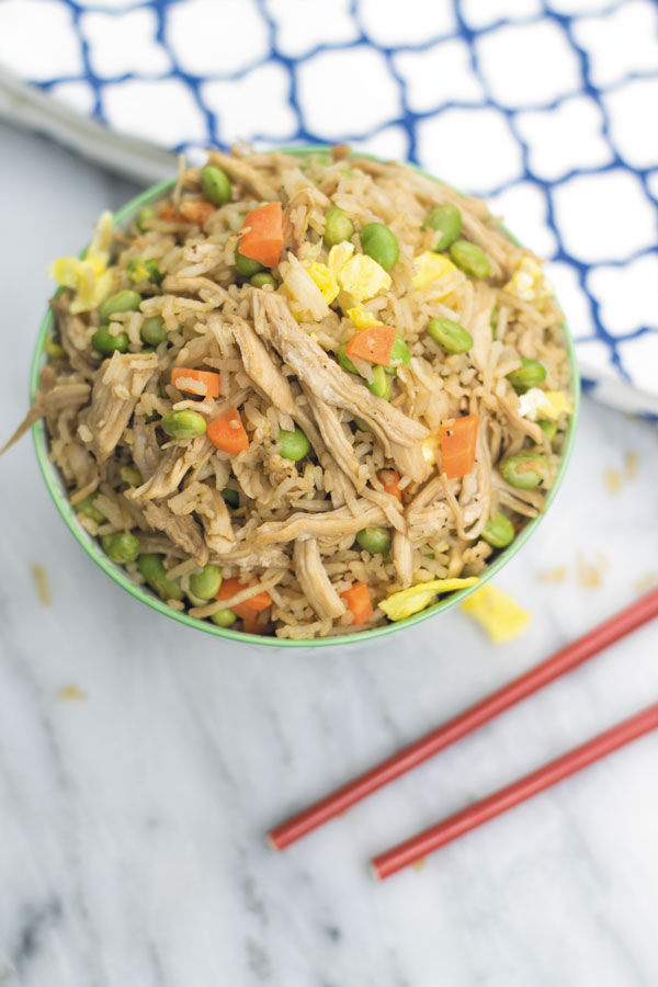 This super delicious CHICKEN FRIED RICE takes 30 mins start to finish, packed with marinated shredded chciken and tons of veggies, this is one meal that will leave you satisfied!