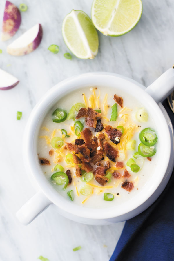 Crockpot skinny potato soup - Comforting CROCKPOT soup, lightened version of POTATO SOUP, mixed with cauliflower which even picky eater's can't tell! A perfect make ahead weeknight meal!