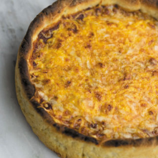 Deep Dish Pizza - Cheesy CHICAGO STYLE pizza, with a SECRET INGREDIENT in the crust that makes is soft & chewy!