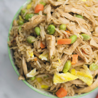 This super delicious CHICKEN FRIED RICE takes 30 mins start to finish, packed with marinated shredded chciken and tons of veggies, this is one meal that will leave you satisfied!