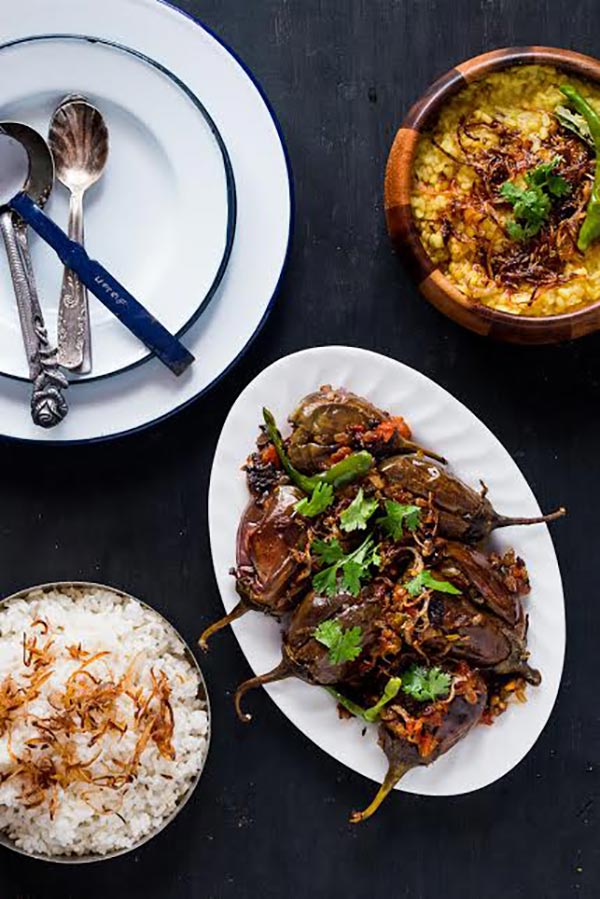 Bharwan Baigan - Indian Style Stuffed Eggplants, tons of flavor, a simple side dish. Great for serving with bread or along side rice & dal! A simple Indian meal that is nourishing too!