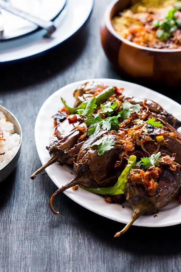 Bharwan Baigan - Indian Style Stuffed Eggplants, tons of flavor, a simple side dish. Great for serving with bread or along side rice & dal!