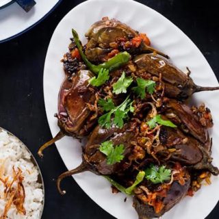 Bharwan Baigan - Indian Style Stuffed Eggplants, tons of flavor, a simple side dish. Great for serving with bread or along side rice & dal!