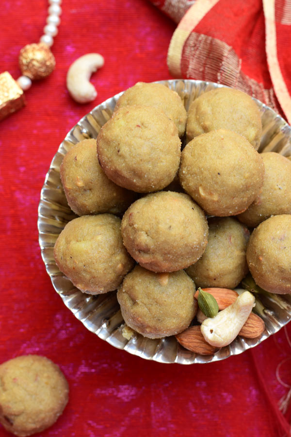 Atta Ladoo - No BAKE sweetened Whole Wheat Flour Laddo (Balls) with nuts. A perfect after workout treat. A popular Indian Sweet packed with health benefits!