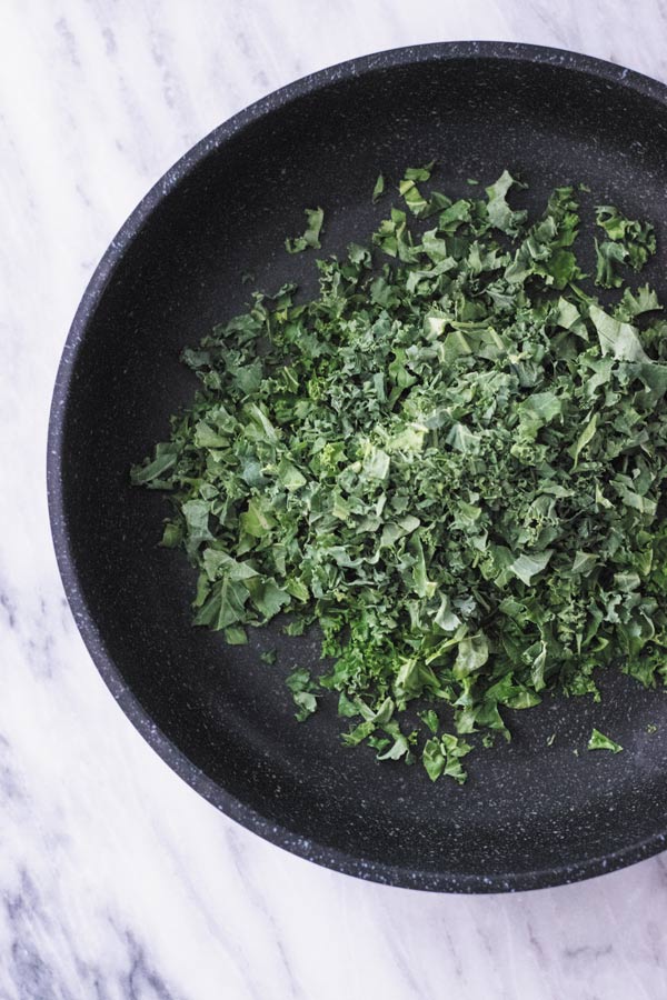 Spicy Kale Fried Rice - Just 15 Mins to make this amazing side dish or adding a protein of choice makes it into a filling meal! It's been on a regular DINNER rotation at our place. My family asks for it every other night for dinner!