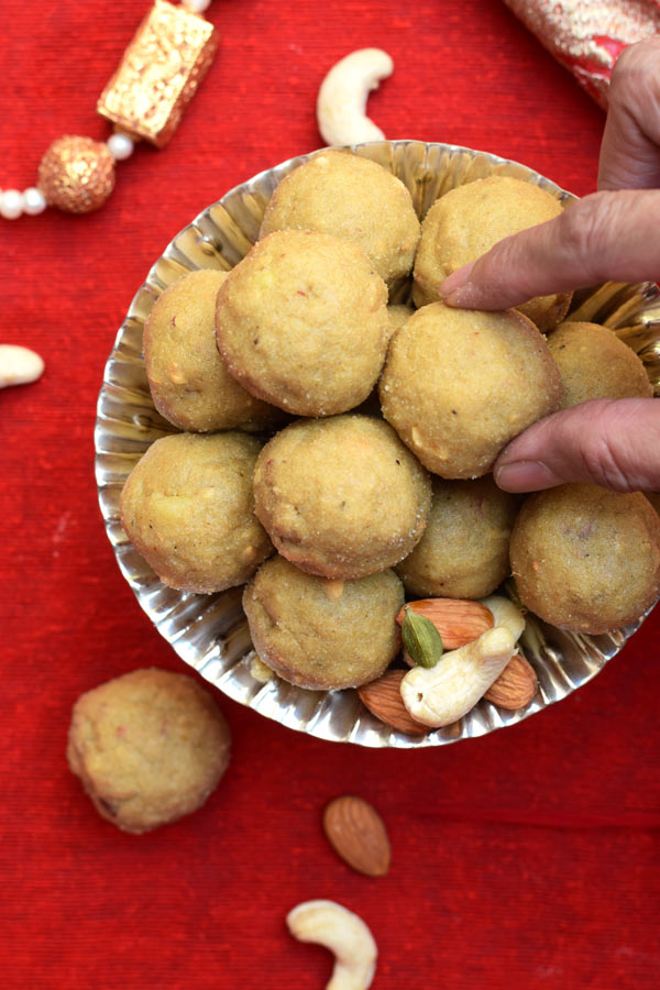 Atta Ladoo - No BAKE sweetened Whole Wheat Flour Laddo (Balls) with nuts. A perfect after workout treat. A popular Indian Sweet packed with health benefits!