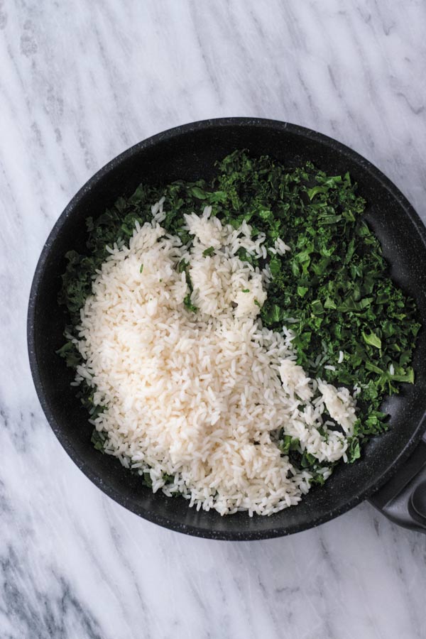 Spicy Kale Fried Rice - Just 15 Mins to make this amazing side dish or adding a protein of choice makes it into a filling meal! It's been on a regular DINNER rotation at our place. My family asks for it every other night for dinner!