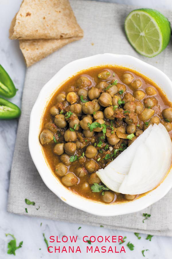 Slow Cooker Chana Masala - Simple wholesome Chana Masala is the most popular Indian curry which youcan make in slow cooker with just 15 mins hands on work! Packed with tons of flavor and protein!
