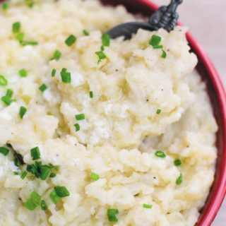Slow Cooker Garlic Mashed Potatoes - make holiday time easier by making everyone's favorite mashed potatoes in SLOW COOKER! No boiling needed! Just throw everything in slow cooker and get on with your life!
