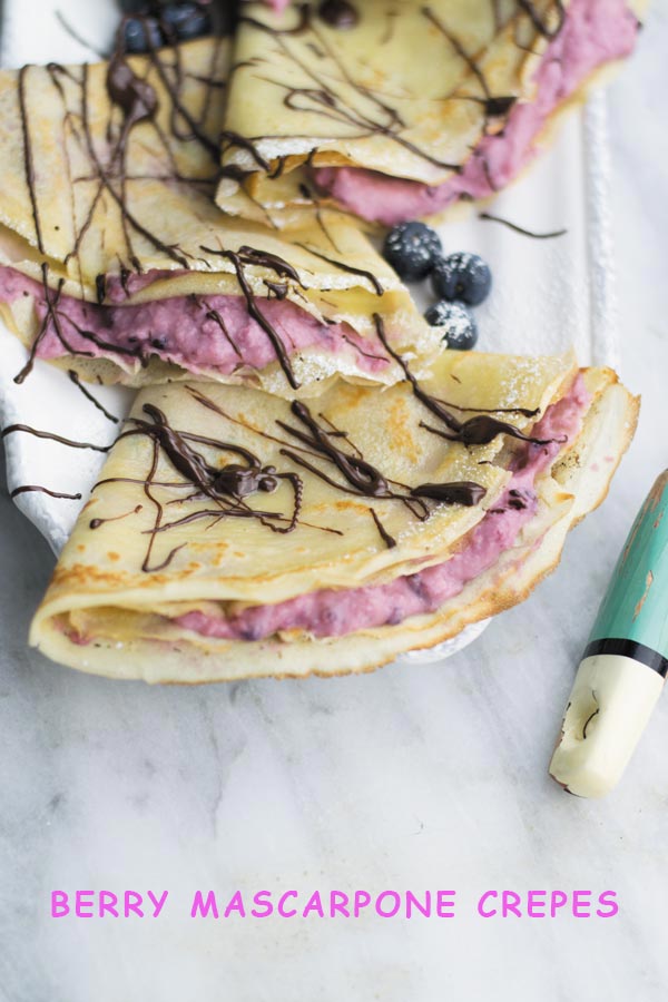 Berry Mascarpone Crepes - delicious from scratch crepes filled with this insanely addicting mixed berries & mascarpone cheese filling.