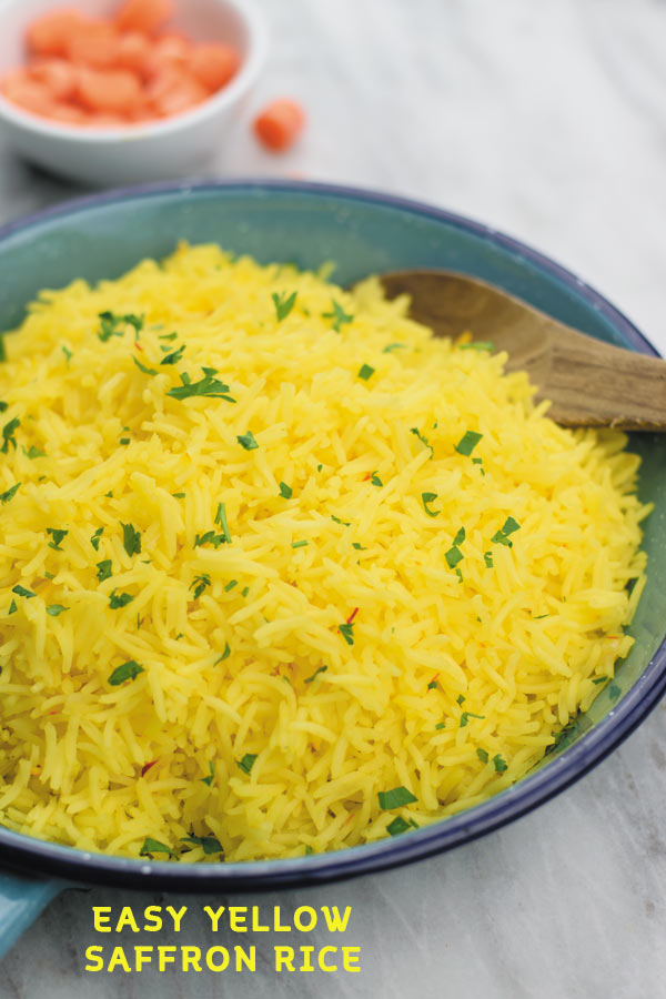 Easy Yellow Saffron Rice - Better Than your favorite Mediterranean restaurant, this SIMPLE yellow saffron rice is full of flavor & GREAT as a side!