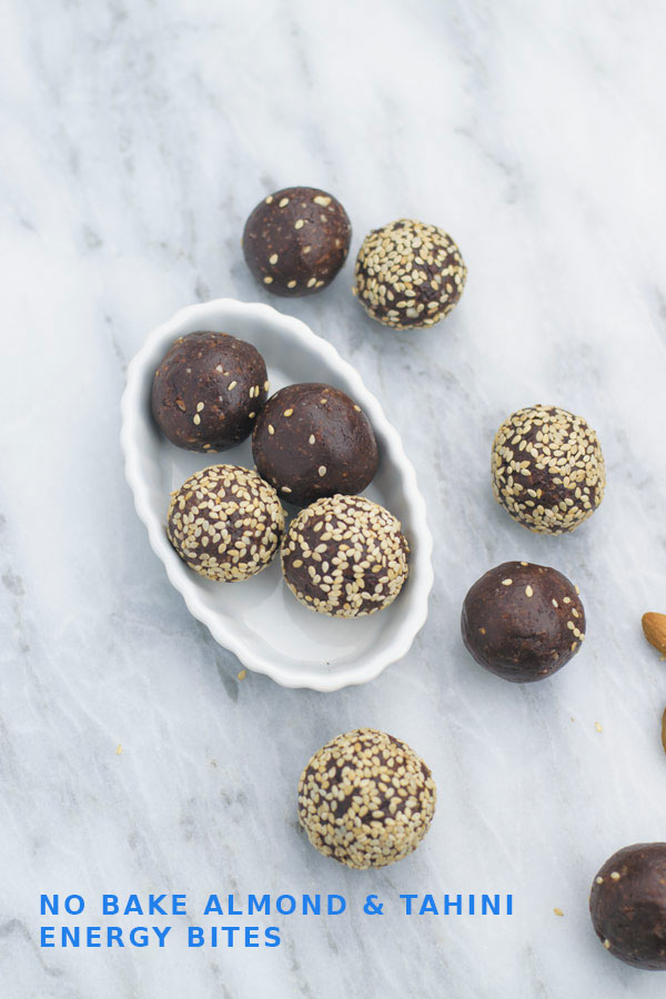 These delicious, just 7 INGREDIENTS & ready under 30 minutes energy bites are so addicting! Packed with healthy almonds, dates, cinnamon, tahini and cocoa powder!