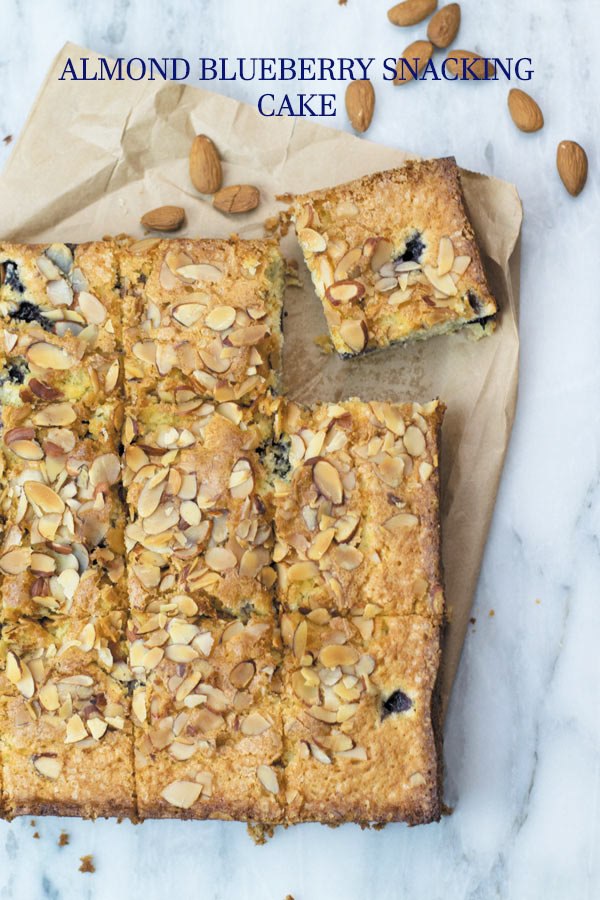almond blueberry snacking cake with roasted almonds title