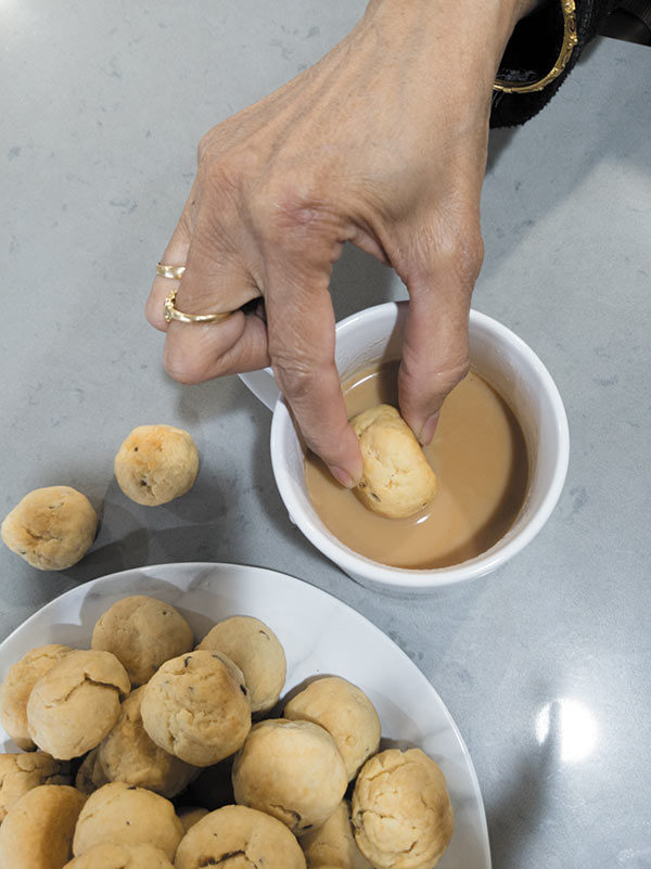 Surati caraway Biscuits eating with chai