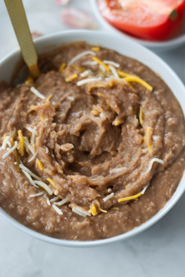 from scratch creamy flavorful refried beans in a bowl