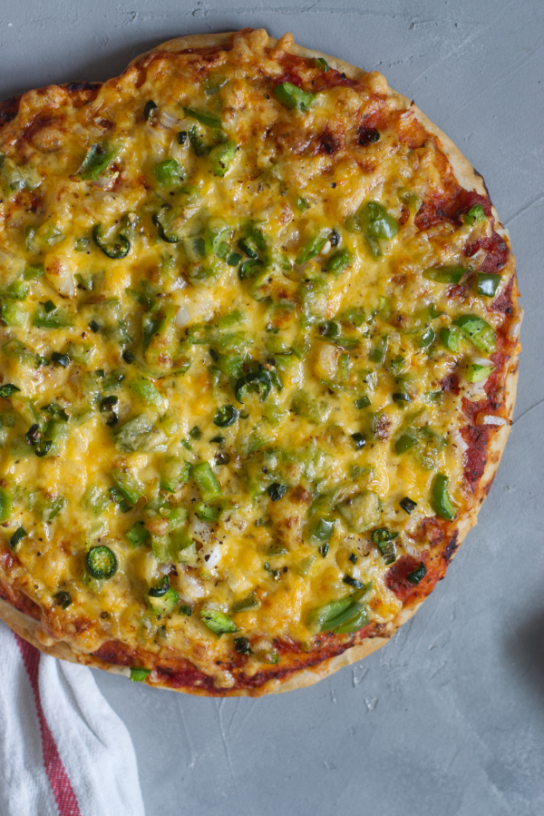 homemade thick crispy bottom pan pizza ready